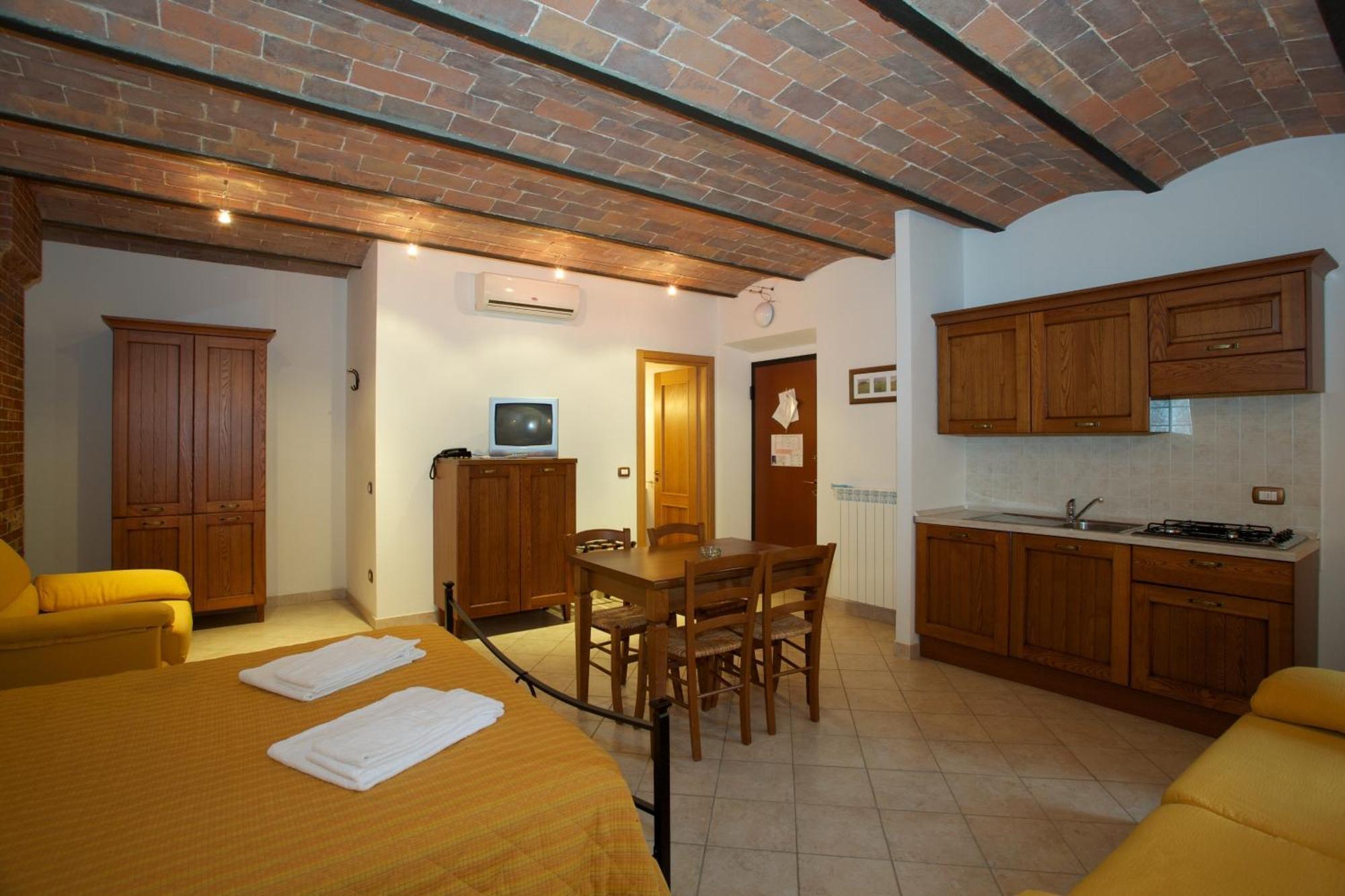 Oasi Del Grillo Aparthotel Castelnuovo Berardenga Quarto foto